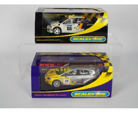 Scalextric - Two boxed Scalextric 1:32 scale slot cars. Lot comprises of Scalextric C2825 'James Thompson' Seat Leon BTCC Spe