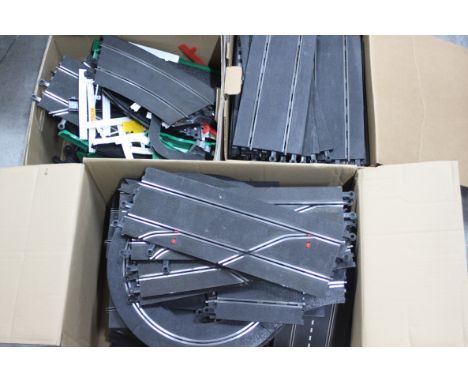 Strombecker, Scalextric - A large quantity of predominately unboxed Scalextric classic track and some accessories. The lot wh