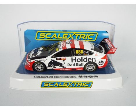Scalextric - A boxed Holden ZB Commodore in Red Bull livery number 888. # C4196. The car appears Mint in a Very Good perspex 