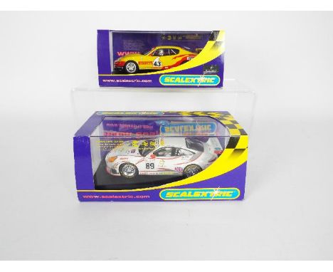 Scalextric - Two boxed Scalextric 1:32 scale slot cars. Lot comprises of Scalextric C2659 Maserati Coupe Cambriocorsa Trofeo 