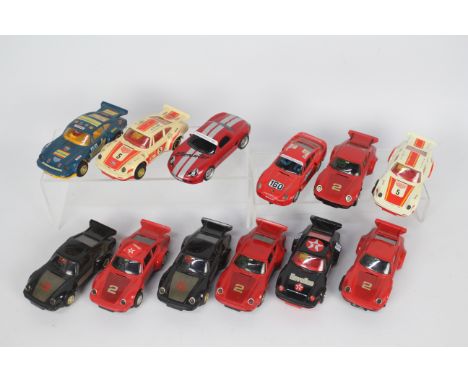 Scalextric - 12 x unboxed Porsche slot cars in 1:32 scale including ten 911 models, a 959, and a Boxster. They all show signs