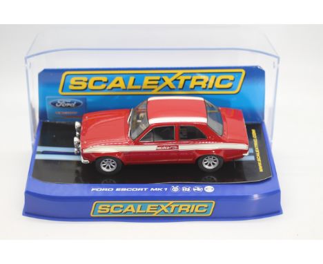 Scalextric - A boxed Scalextric C3113 Ford Escort Mk.1 Mexico 1:32 scale slot car. The model appears to be in Mint condition 