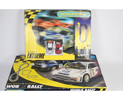 Scalextric - 2 x sets in 1:32 scale, # C1048 World Rally with Ford Focus and Subaru Impreza, # Speed Extreme Advanced Track S