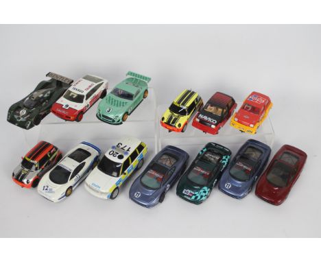 Scalextric - Carrera - 13 x unboxed slot cars including five Jaguar XJ220 models, two Mini Coopers, two Mighty Metros, a Poli