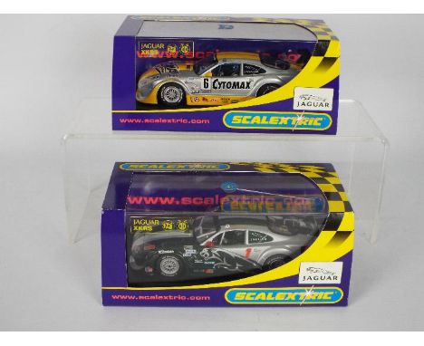 Scalextric - Two boxed Scalextric Jaguar XKRS 1:32 scale slot cars. Lot comprises Scalextric C2711 'Rocketsports' RN1; togeth