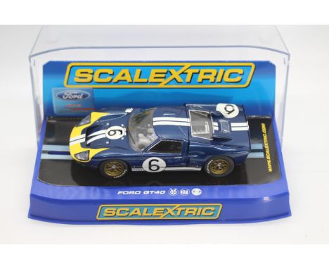 Scalextric - A boxed Scalextric C3097 Ford GT40 Mk11 1966 'Andretti/Bianchi' RN6 1:32 scale slot car. Model appears to be in 