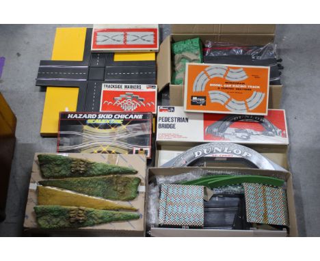 Monogram, Scalextric - A mixed collection of unboxed and boxed vintage slot car track and accessories. Lot includes a boxed S
