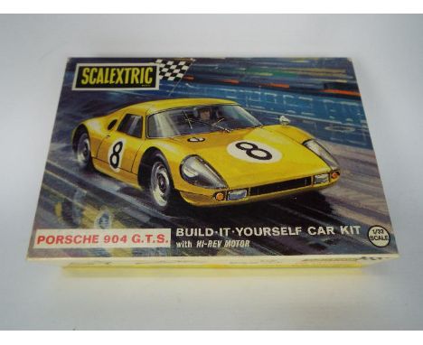 Scalextric - A rare vintage boxed Porsche 904 G.T.S self build kit # CK/2. The kit contains 2 x built up cars and some spare 