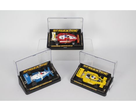 Scalextric - 3 x boxed models, Ferrari 312T3 # C136, Elf Renault RS-01 # C134, Elf Tyrell 008 # C135. All three cars appear i