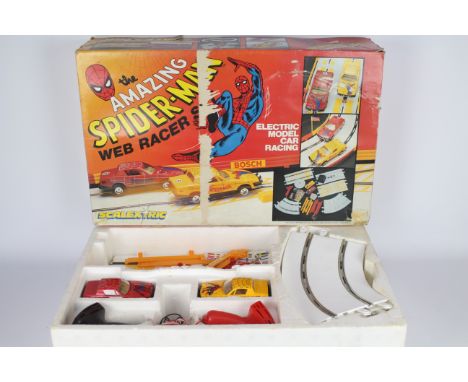 Scalextric - A rare boxed Spiderman Web Racer Set # C672. This unique set with two Spiderman logo Triumph TR7 cars and a whit