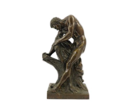 After Edme Dumont (French, 1722-1775), a cast bronze figure of the Milo of Croton ripping apart a tree stump, on integral nat
