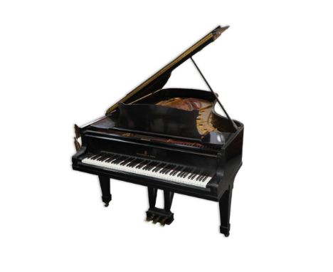A Steinway &amp; Sons ebonised grand pian, Model B no. 270554, with ivory keys and squared tapered legs with spade feet, 210c