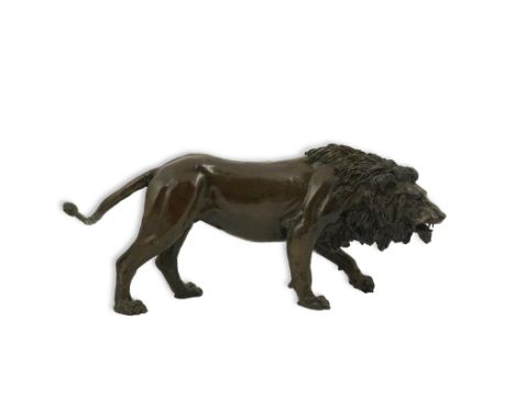 § § James Osborne (English, 1940-1992), a bronze model of a prowling lion, signed in the bronze and numbered 2/10, 49cm long,