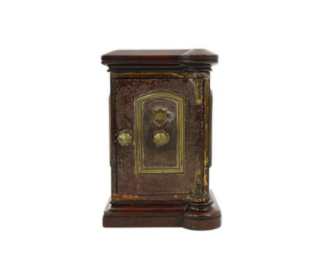A late Victorian mahogany mounted brass and cast iron demonstration model of a safe, with painted finish and fitted interior,