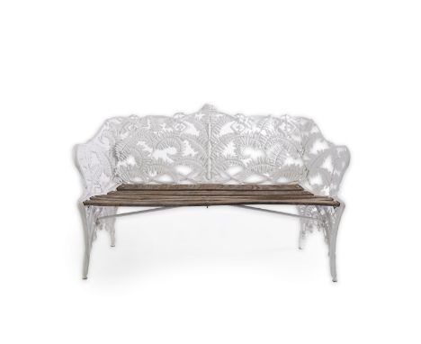 A Coalbrookdale style cast iron garden bench with fern and grape pattern and oak slatted seats, 193cm wide, 54cm deep, 93cm h