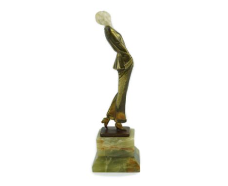 Josef Lorenzl (Austrian, 1892-1950), an Art Deco bronze and ivory figure of a lady wearing a stylish trouser suit, signed in 