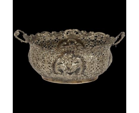 An ornate Victorian silver 2-handled table basket, with allover embossed and pierced decoration, W17.5cm, hallmarks for Sheff