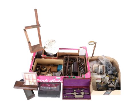 2 boxes of various watchmaker's tools, including pivoting tool, revolving screwdriver stands, pliers sharpening stone, access