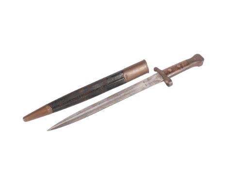 A British 1888 pattern bayonet and scabbard, by Wilkinson of London, military issue. Blade length - 30cm, overall - 44cm.Good