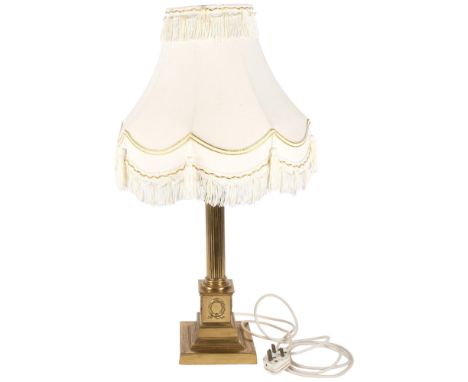 A large brass Corinthian column table lamp with associated shade. H - 67cm. 