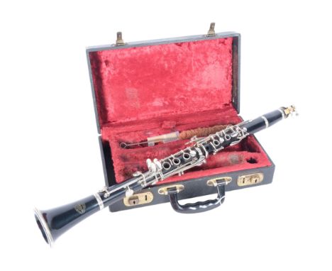 A Corton clarinet, SN 609393, in hard shell case. 