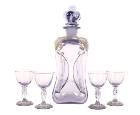 Holmegaard, a 1920s Danish Kluck Kluck for Kuttrolf amethyst decanter with applied pewter decoration, and 4 matching glasses,