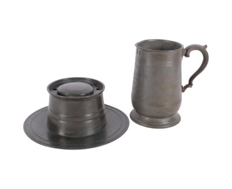 A pewter quart tankard engraved Thos Jarrett Ferry Boat Inn Rye, stamped VR1892, and a large Capstan inkwell 