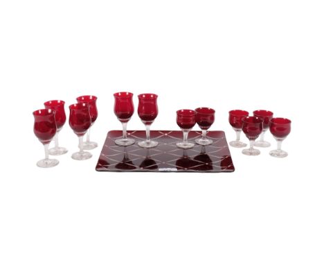 A suite of 6 ruby Sherry glasses, and 6 ruby glass liqueur shot glasses, on an Art Deco style ruby glass tray, tray measures 