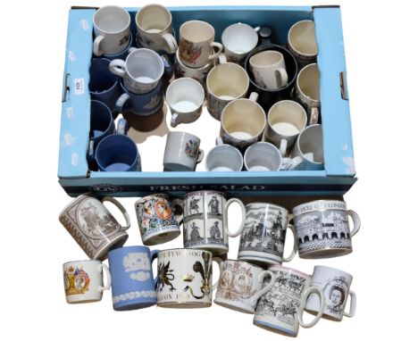 A boxful of Royal commemorative mugs, including Wedgwood Jasperware, and Trafalgar and Bayeux tapestry mugs 