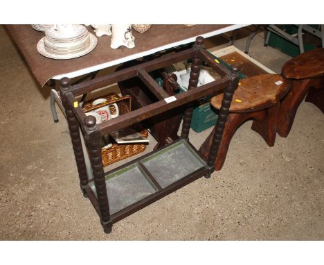 An oak barley twist stick stand