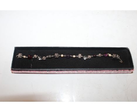 A 925 silver amethyst garnet and pearl set bracelet