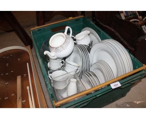 A box containing various dinnerware, table lamp, glassware etc.