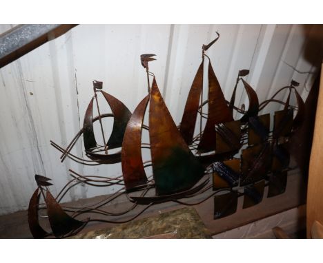 Two items of metal wall art
