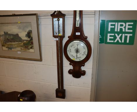 An oak cased stick barometer