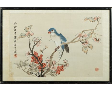 A Japanese wood block print on rice paper: depicting a parakeet perched on a blossoming shrub, 32 x 46cm.
