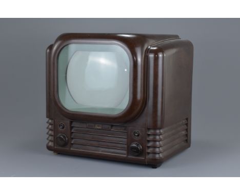 A vintage 1949 Bush mottled brown Bakelite television. 39cm width
