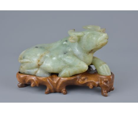 Chinese carved Celadon Jade Ox on a Carved Rosewood Stand, 16cms long