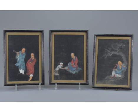 Three Chinese 19th century paintings framed and glazed on woven black material of Luohan under a tree with ruyi sceptre, Luoh