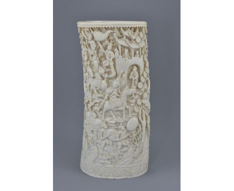 A quality large Chinese late Qing dynasty / Republic period ivory vase deeply carved with figures in battle scene with swords