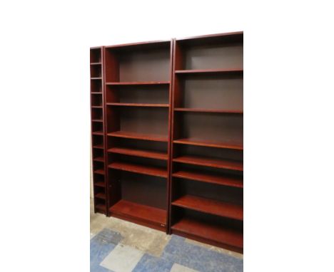 Two Adjustable Seven Shelf Seven Shelf Open Bookcases and a Narrow Example