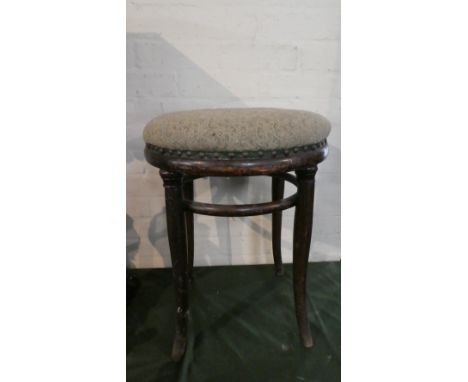 A Vintage Bentwood Circular Topped Stool, 52cm high 