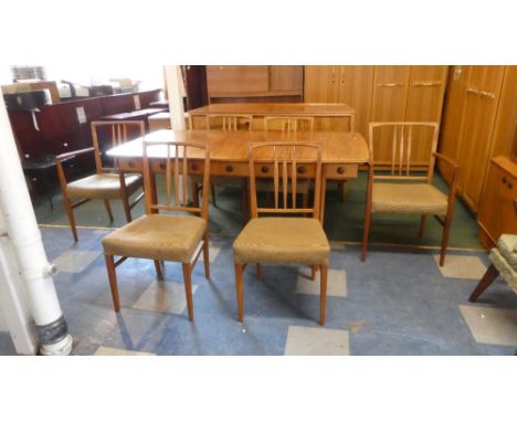 A Gordon Russell Vintage Dining Room Suite Comprising Extending Dining Table and Six Chairs Together with Sideboard Having Fo