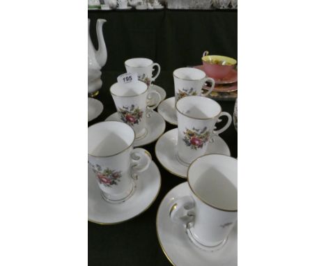 A Set of Six Royal Worcester Floral Patterned Coffee Cups and Saucers 