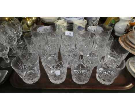 A Tray Containing Nineteen Cut Glass Whisky Glasses