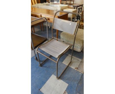 A Vintage Metal Framed Du-al Stacking Chair 