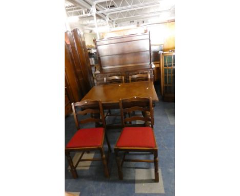 A Dining Room Suite Comprising Draw Leaf Table, Four Ladder Back Chairs and Dresser 
