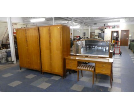 A Vintage Crossbanded Bedroom Suite Comprising Gents and Ladies Wardrobes, Dressing Table and Stool