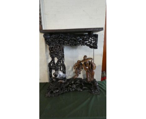 An Oriental Ornately Carved Charger Stand Converted to Side Table Decorated with Immortal and His Attendant, Water Buffalo, F