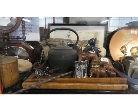 A Tray of Curios to Include Iron Kettle, Mask Head Poker, Carved Wooden Elephants, Pictures and Prints, Trays etc
