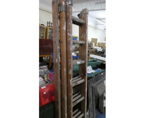 A Wooden Extending Triple Ladder